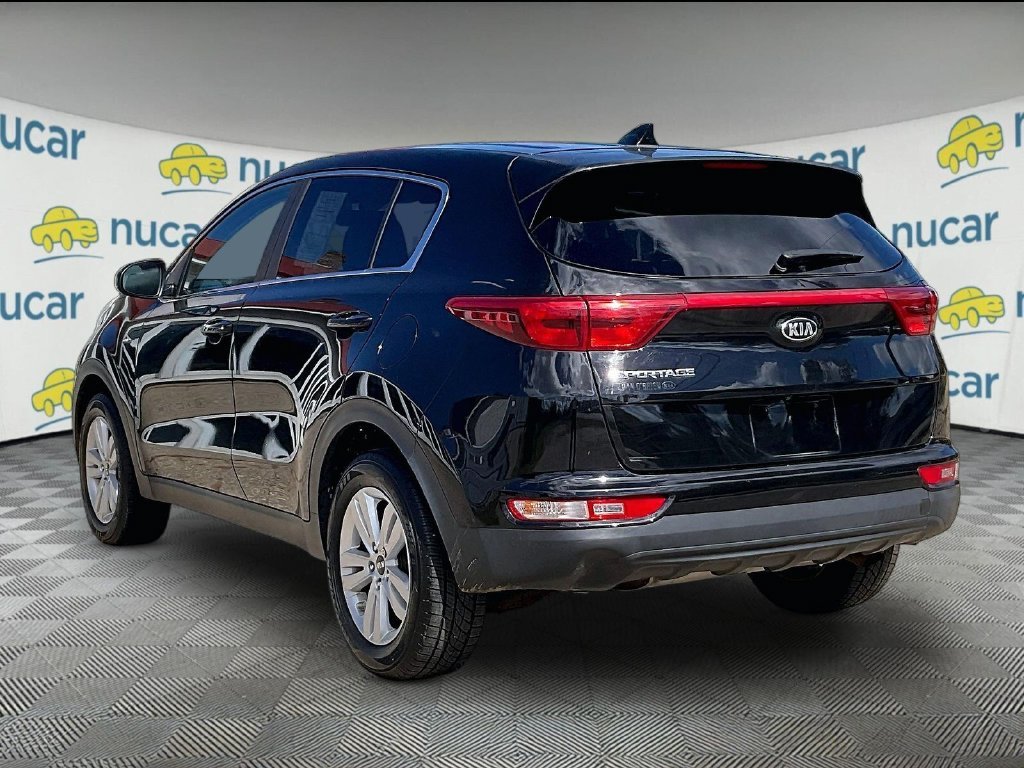 Used 2018 Black Cherry Kia LX image 4
