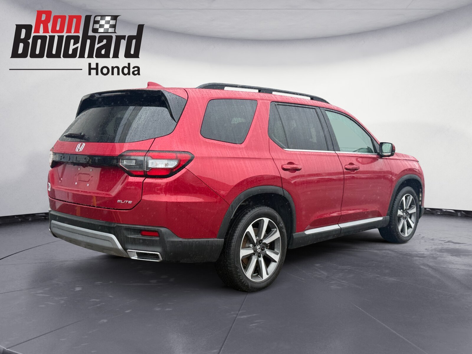 Certified Used 2024 Radiant Red Metallic II Honda AWD ELITE image 2