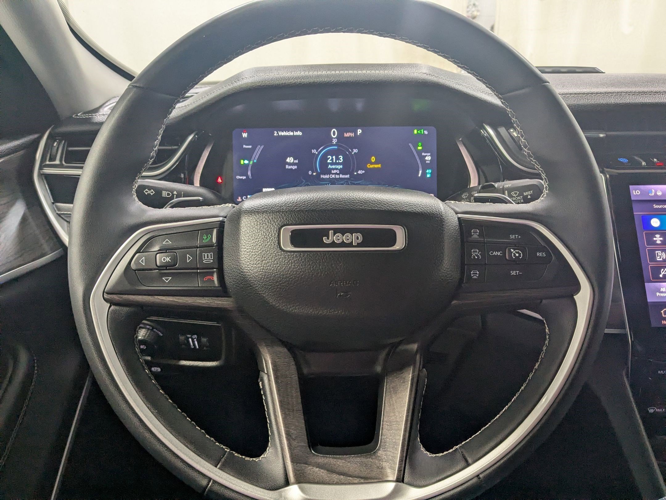 Used 2023 Bright White Clearcoat Jeep 4xe image 11