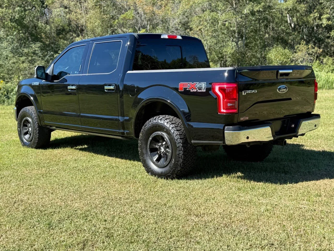 Used 2017 Black Ford Lariat 4x4 4dr SuperCrew 5.5 ft. SB image 3