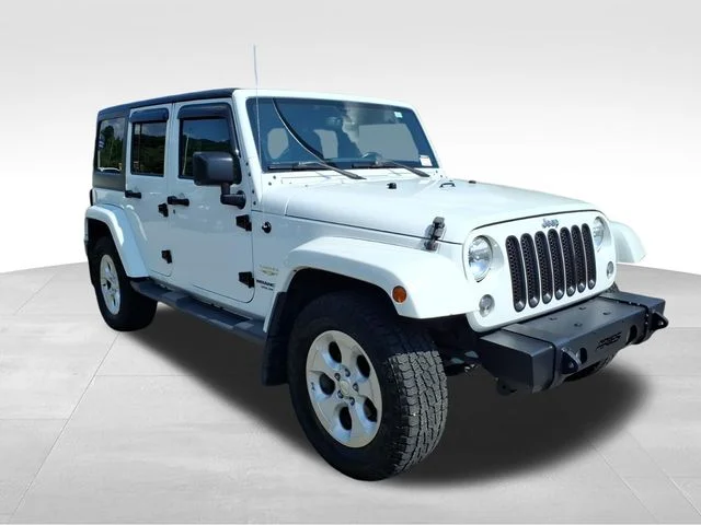 Used 2015 White Jeep Unlimited Sahara image 13
