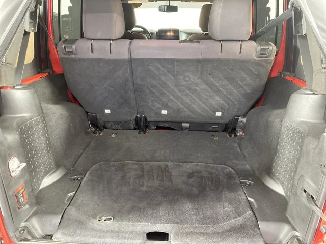 Used 2013 Red Jeep Unlimited Sport image 5