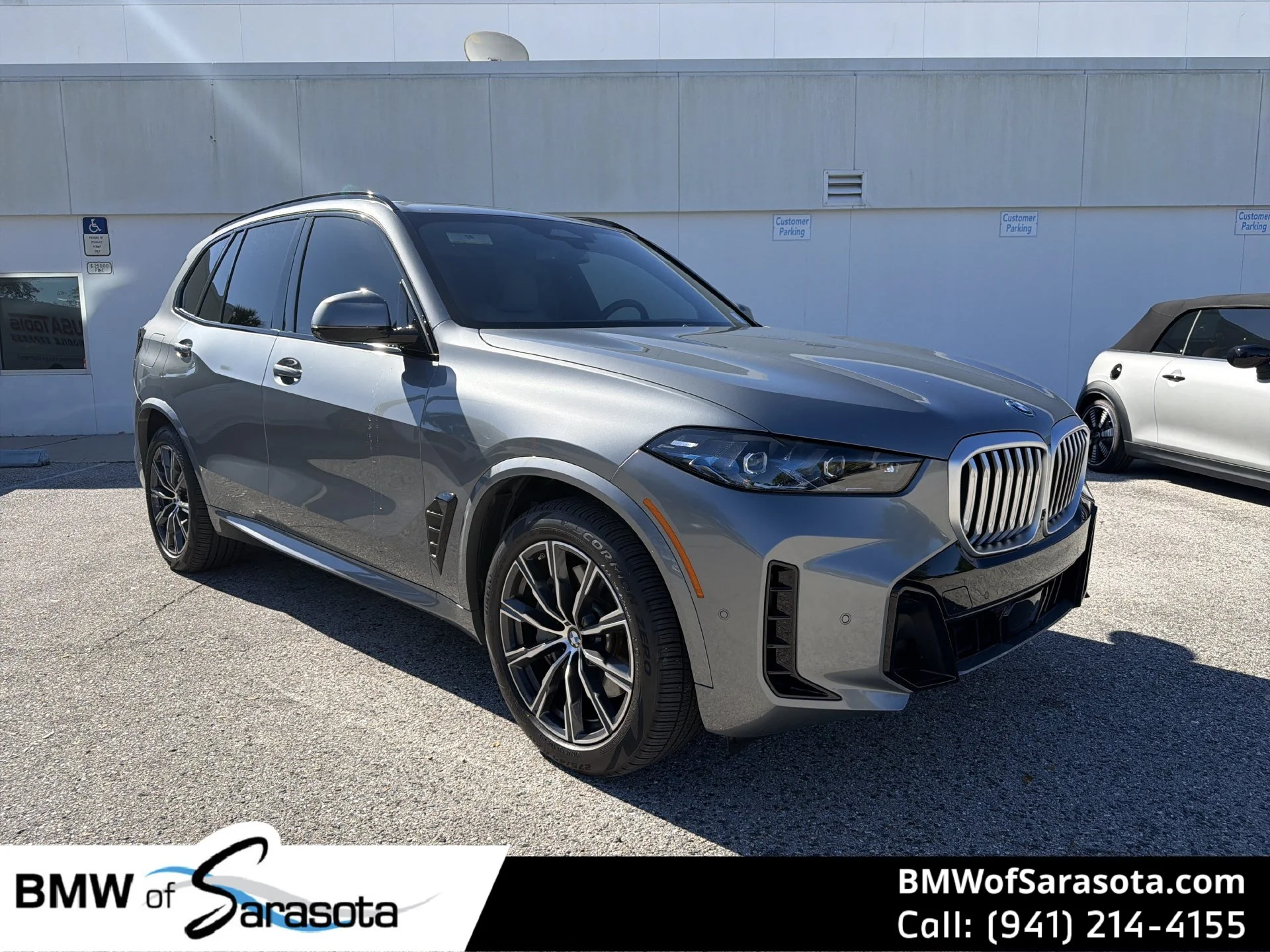 Used 2026 Gray BMW xDrive50e image 1