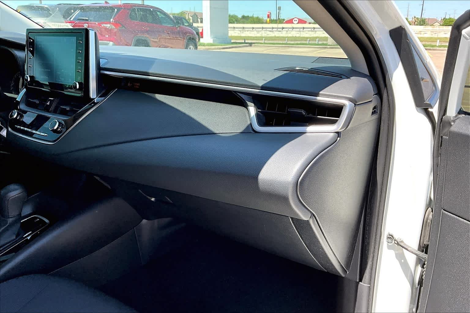 Used 2021 Super White Toyota LE image 19