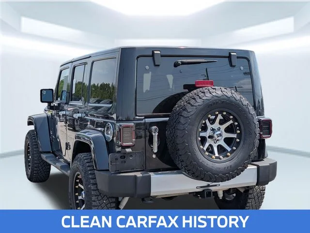 Used 2013 Black Jeep Unlimited Sahara image 3