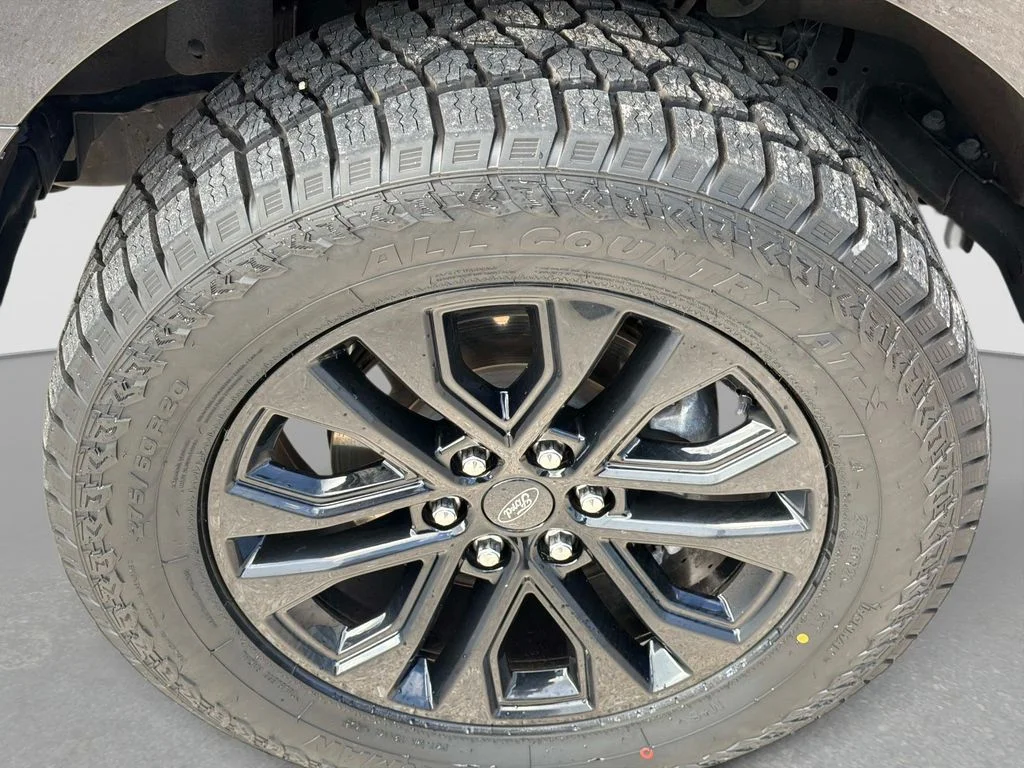 Used 2025 Agate Black Metallic Ford XLT image 12