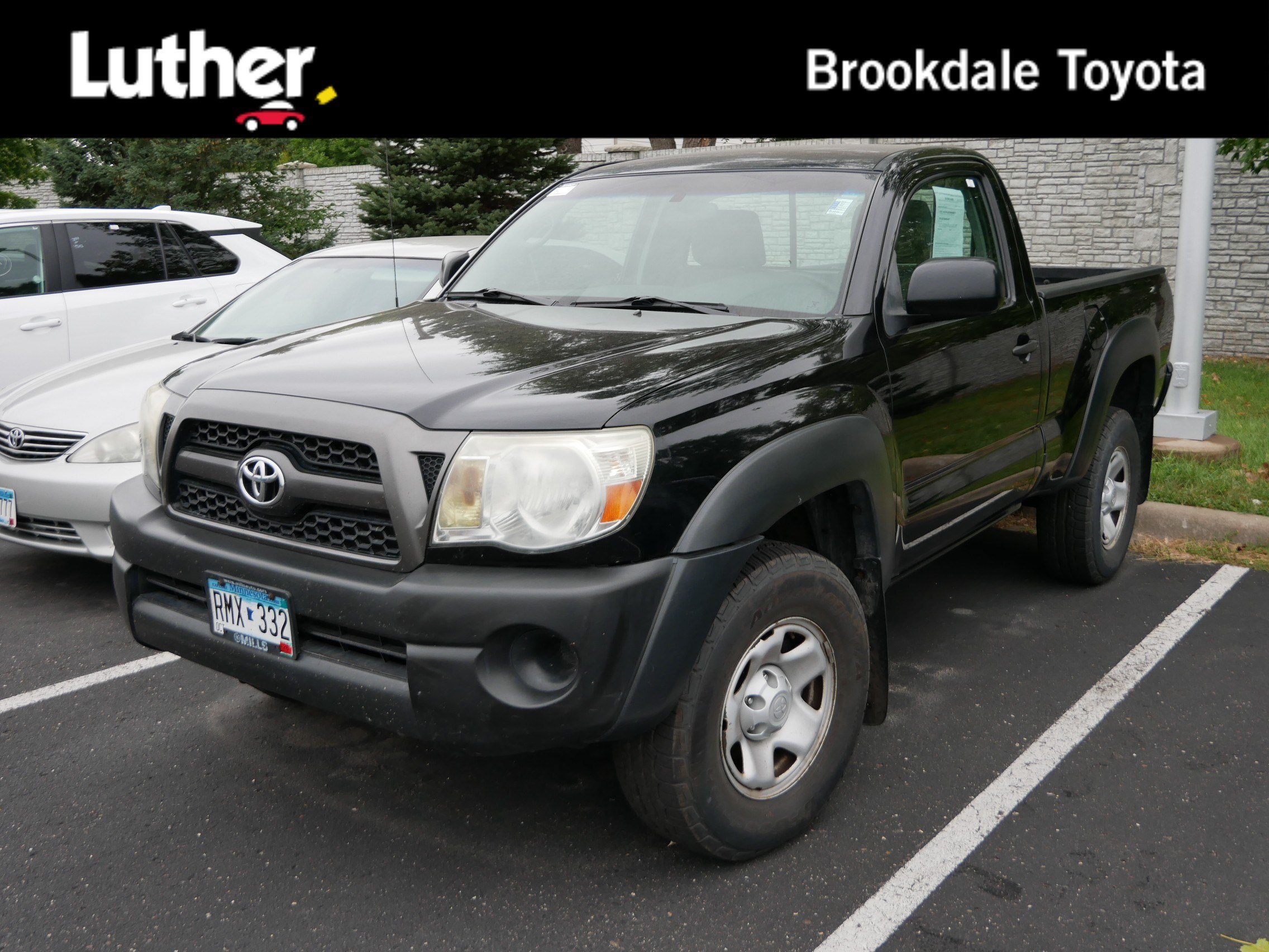 Used 2011 Black Toyota REG CAB 4WD AT image 1