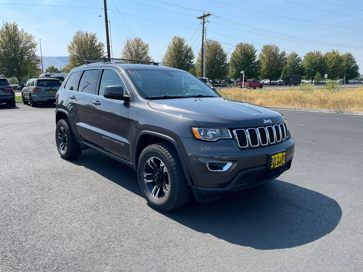 Used 2017 Gray Jeep Laredo image 1