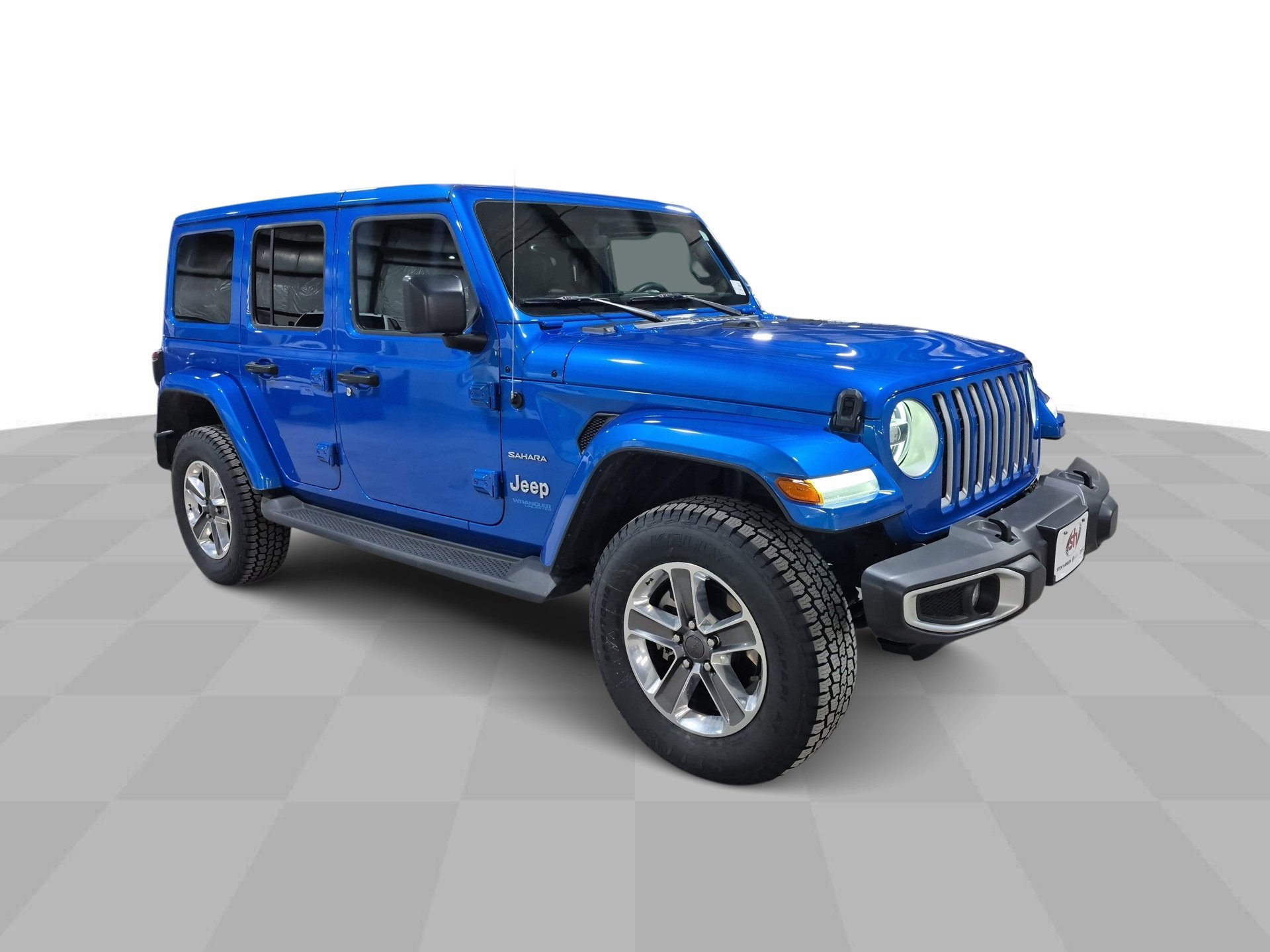 Used 2021 Jeep Wrangler Unlimited Sahara 4XE with VIN 1C4JJXP60MW676813 for sale in Clive, IA