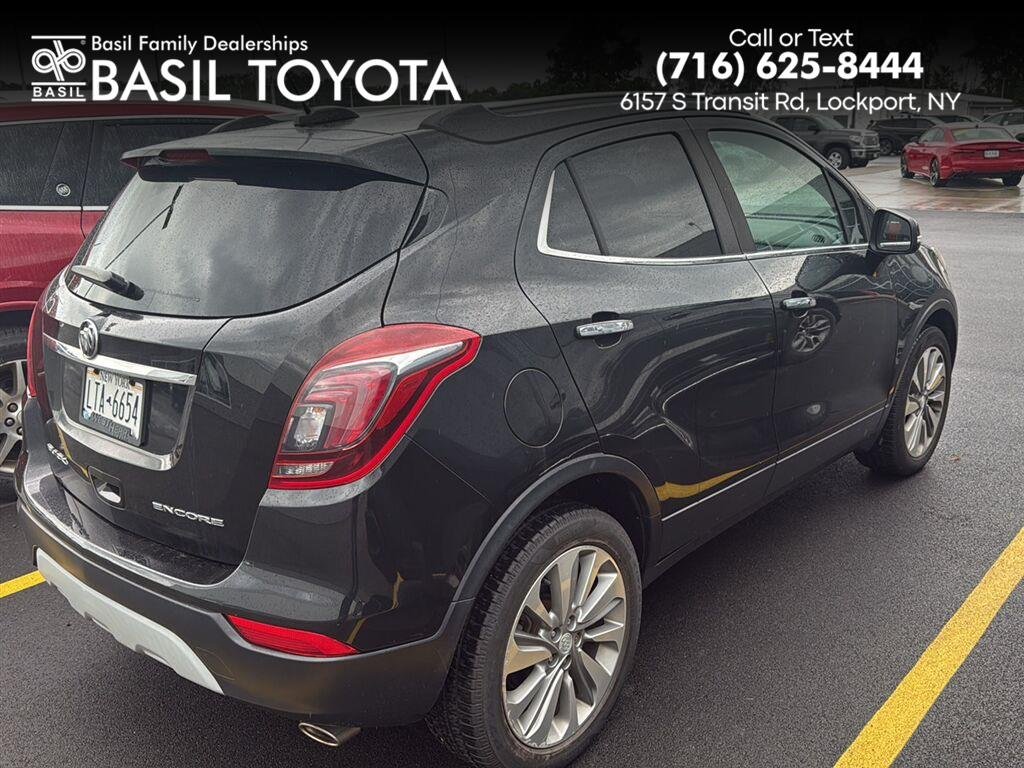 Used 2018 Ebony Twilight Metallic Buick Preferred image 1