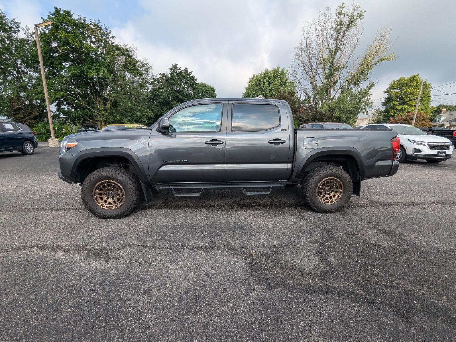 Used 2023 Magnetic Gray Metallic Toyota Trail Edition image 4