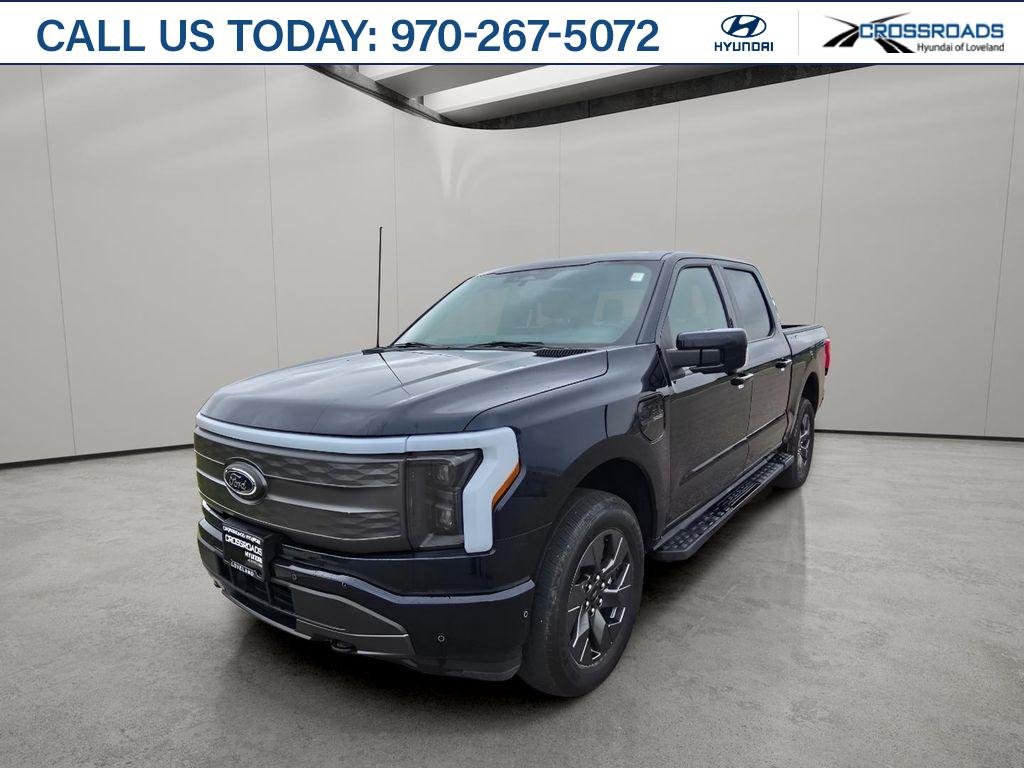 Used 2022 Antimatter Blue Metallic Ford LARIAT image 1
