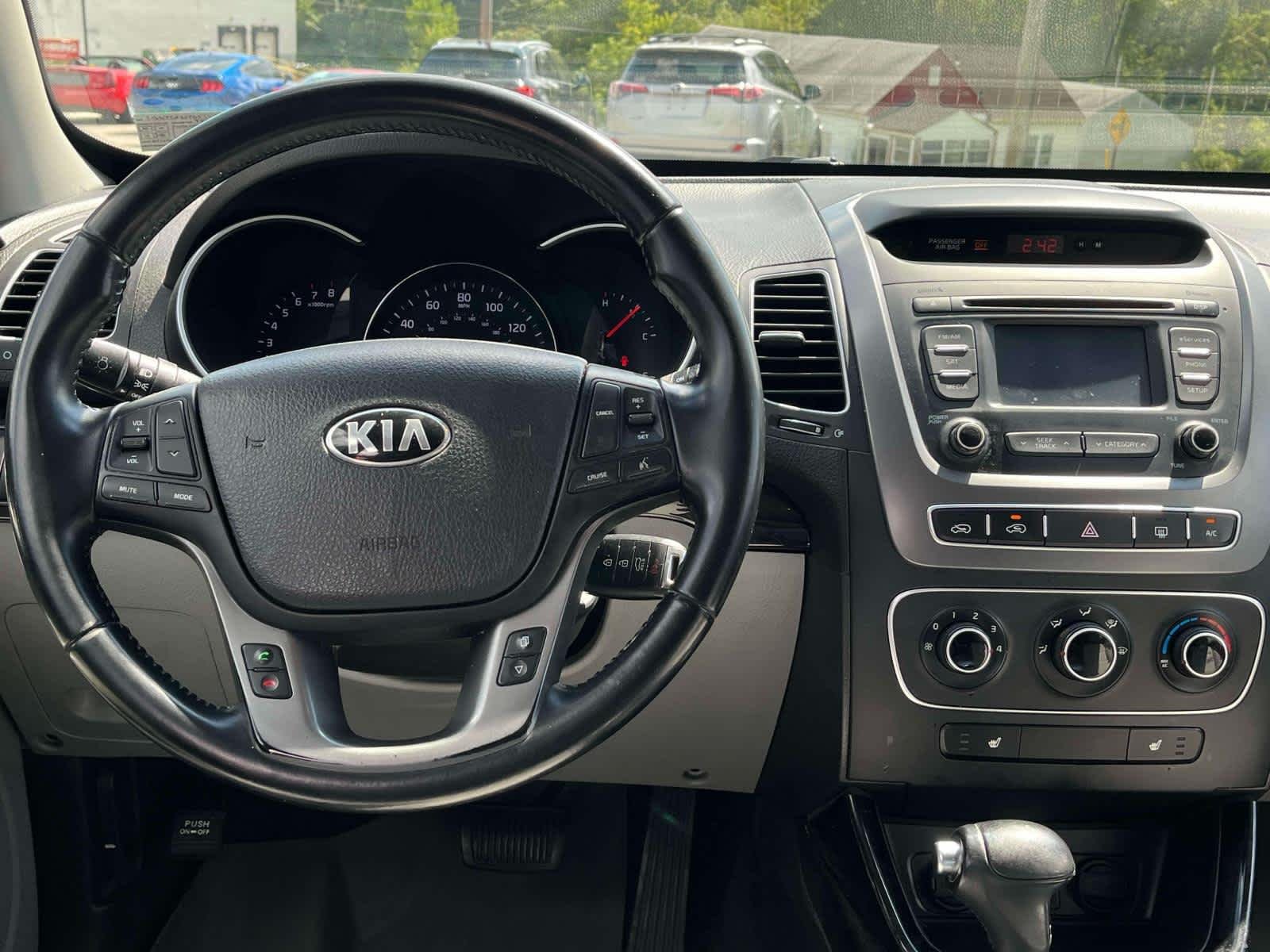 Used 2015 Bright Silver Kia LX image 2