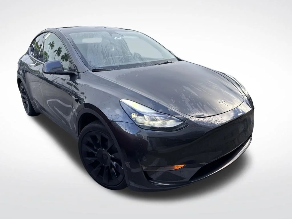 Used 2024 Tesla Model Y Long Range with VIN 7SAYGDED2RF038168 for sale in Miami, FL
