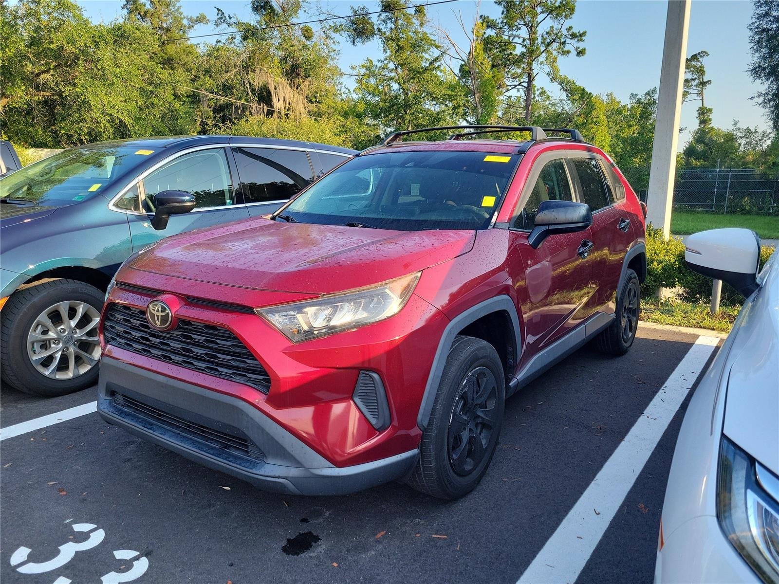 Used 2020 Ruby Flare Pearl Toyota LE image 1