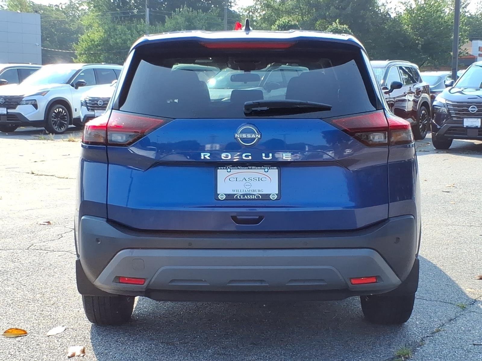 Used 2023 Caspian Blue Metallic Nissan S image 8