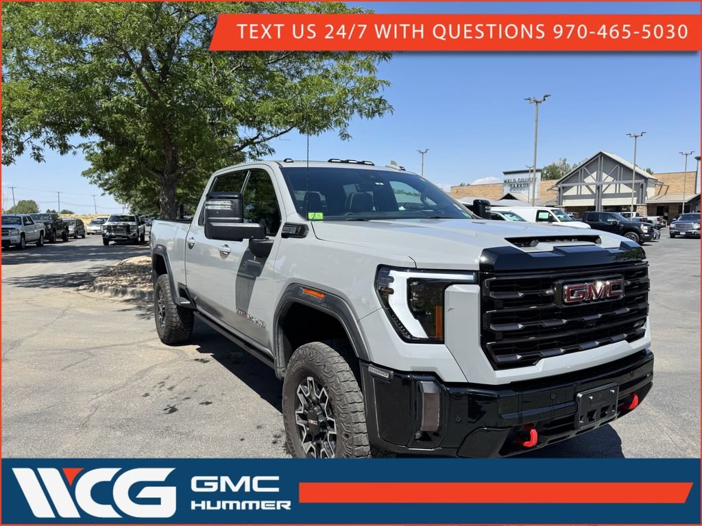 Used 2024 Thunderstorm Gray GMC AT4X image 1