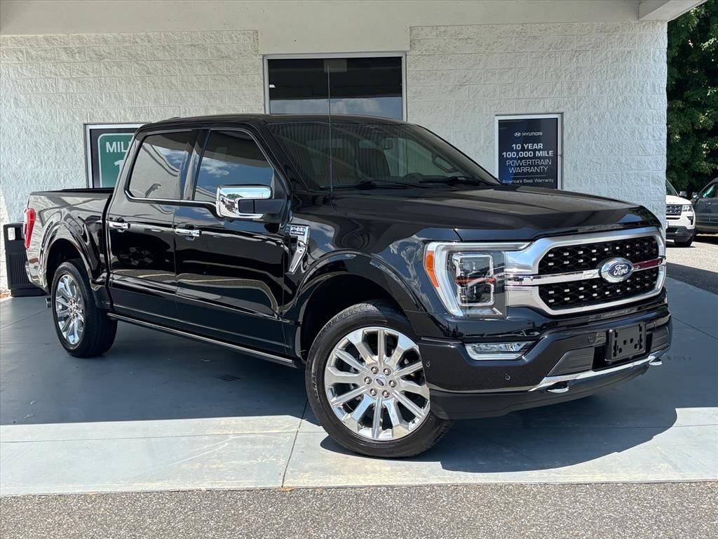 Used 2023 Black Metallic Ford Platinum image 1