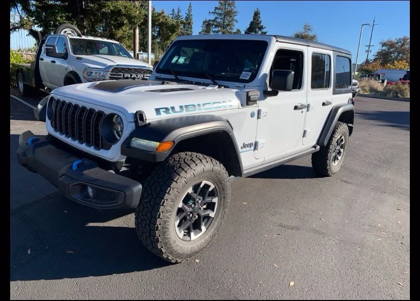 Used 2024 Bright White Clearcoat Jeep Rubicon 4xe image 1