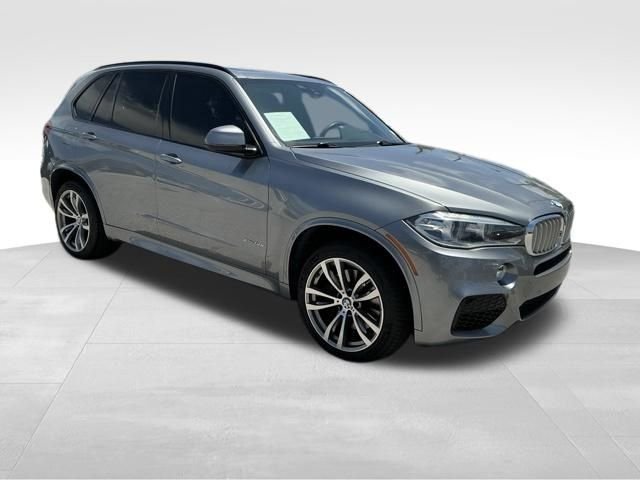 Used 2014 BMW X5 xDrive50i with VIN 5UXKR6C54E0J71963 for sale in Lake Park, FL