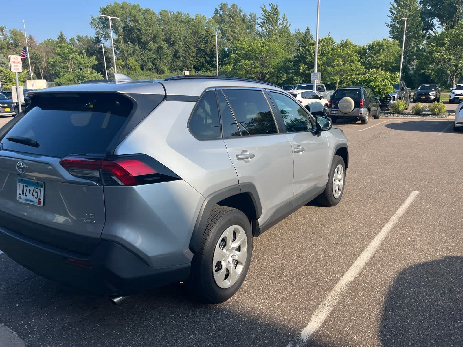 Used 2019 Silver Sky Metallic Toyota LE image 6