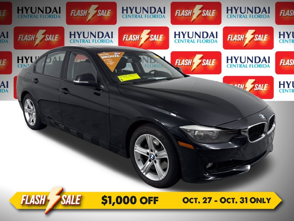 Used 2013 Black BMW 328i xDrive image 1