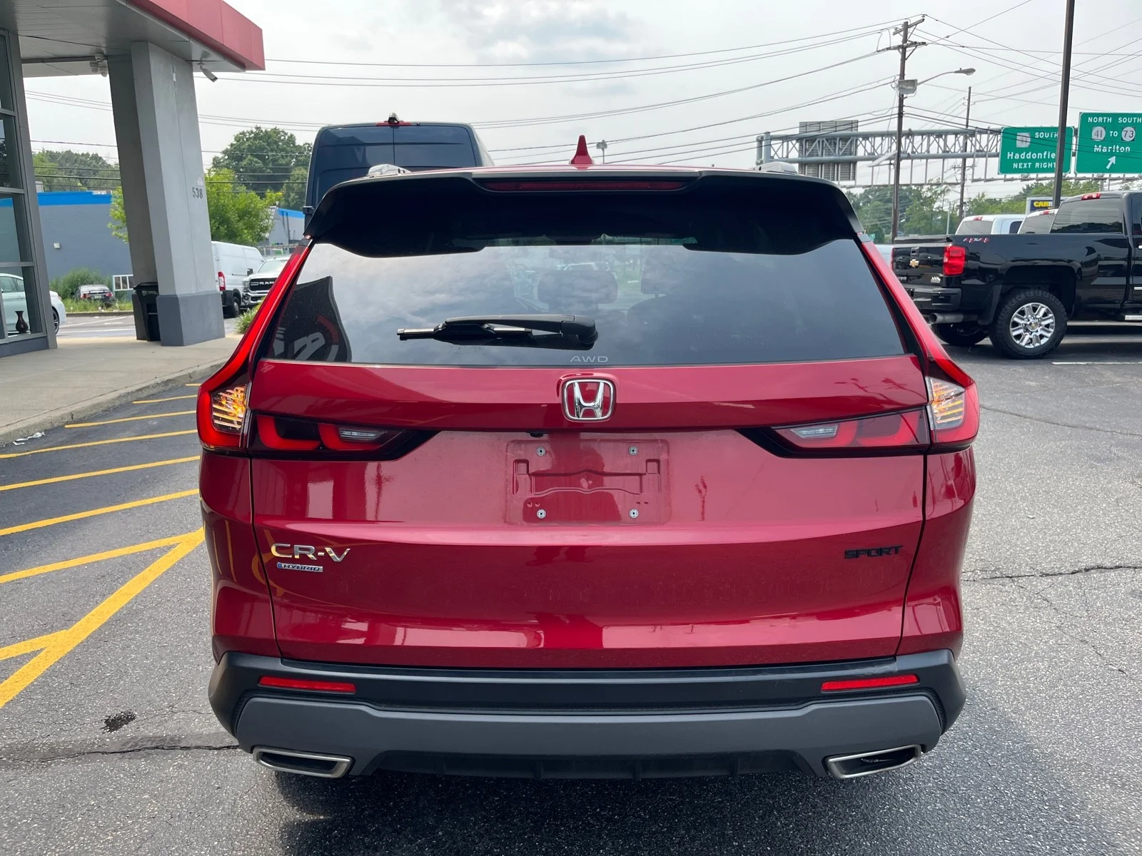 Used 2023 Radiant Red Metallic Honda Sport AWD image 5