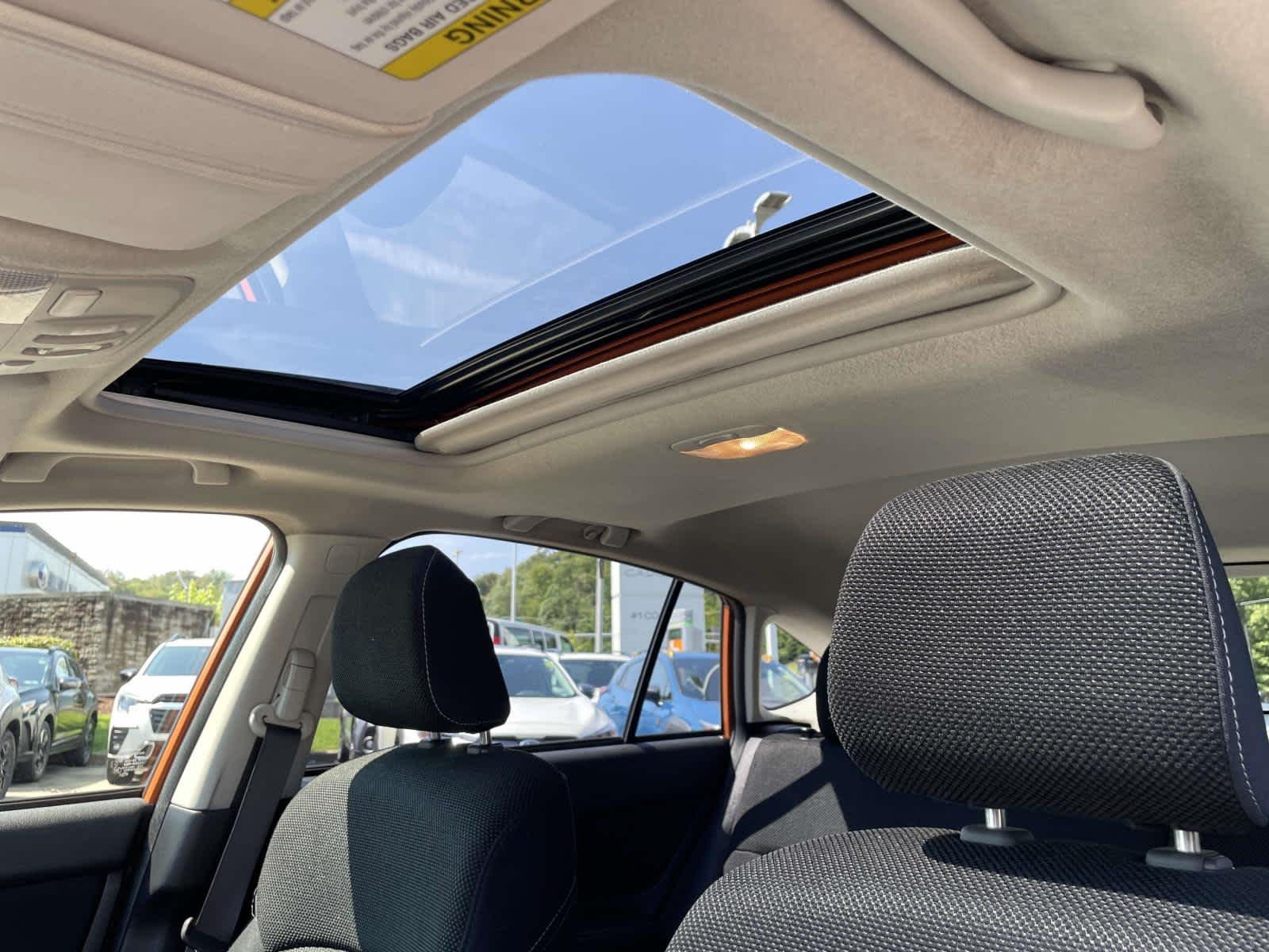 Used 2015 Tangerine Orange Pearl Subaru Premium image 6