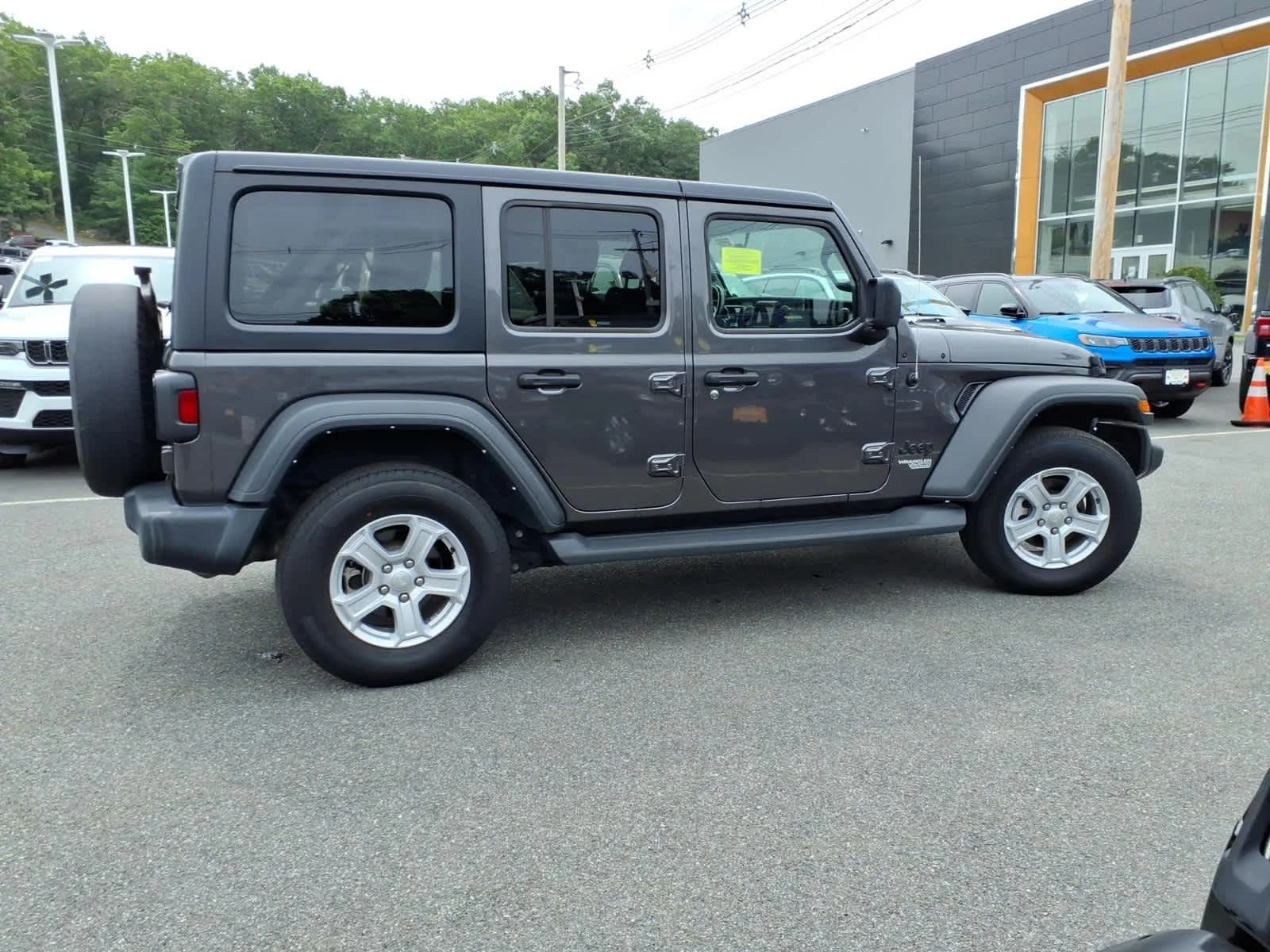 Certified Used 2021 Granite Crystal Metallic Clearcoat Jeep Unlimited Sport S image 6