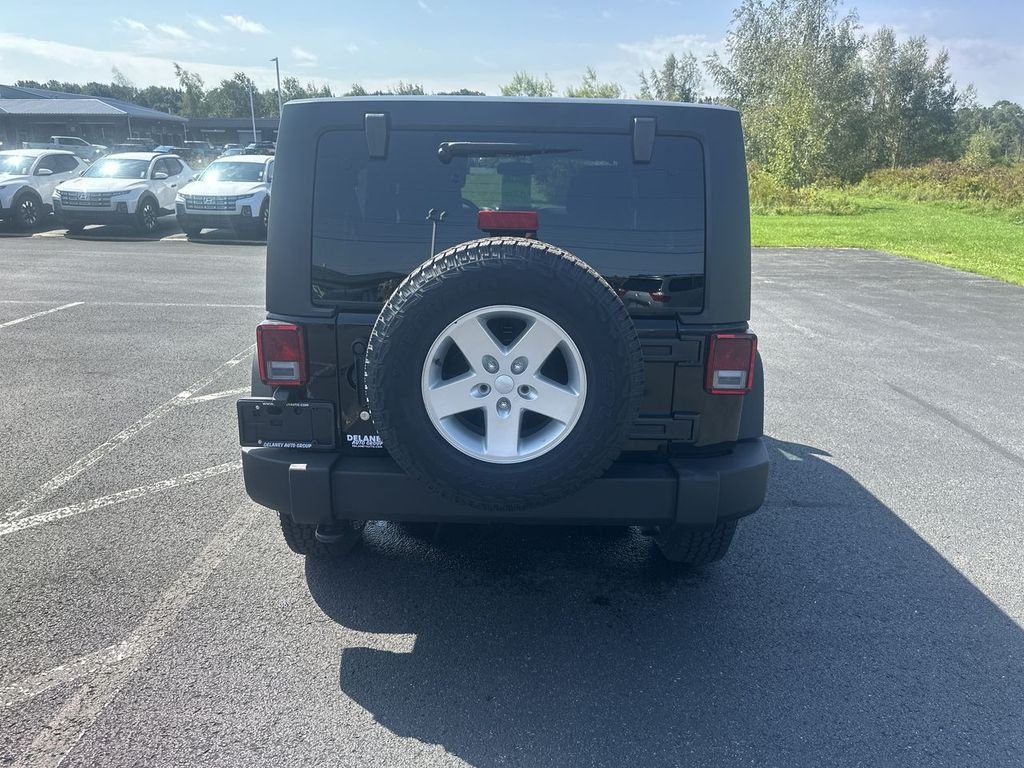 Used 2014 Black Jeep Unlimited Sport image 7