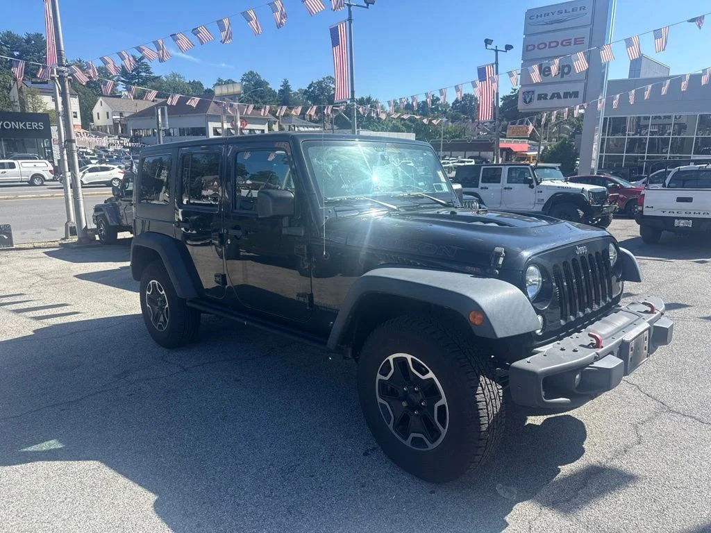 Used 2016 Black Jeep Unlimited Rubicon image 1