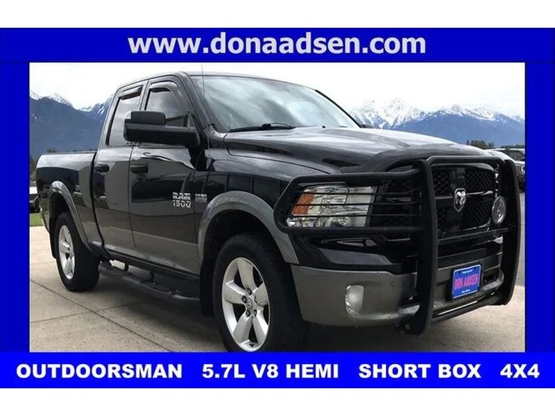 Used 2013 Black Clearcoat Ram Outdoorsman image 1