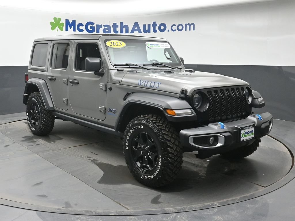 Used 2023 Jeep Wrangler 4xe Willys 4XE with VIN 1C4JJXN69PW592092 for sale in Cedar Rapids, IA