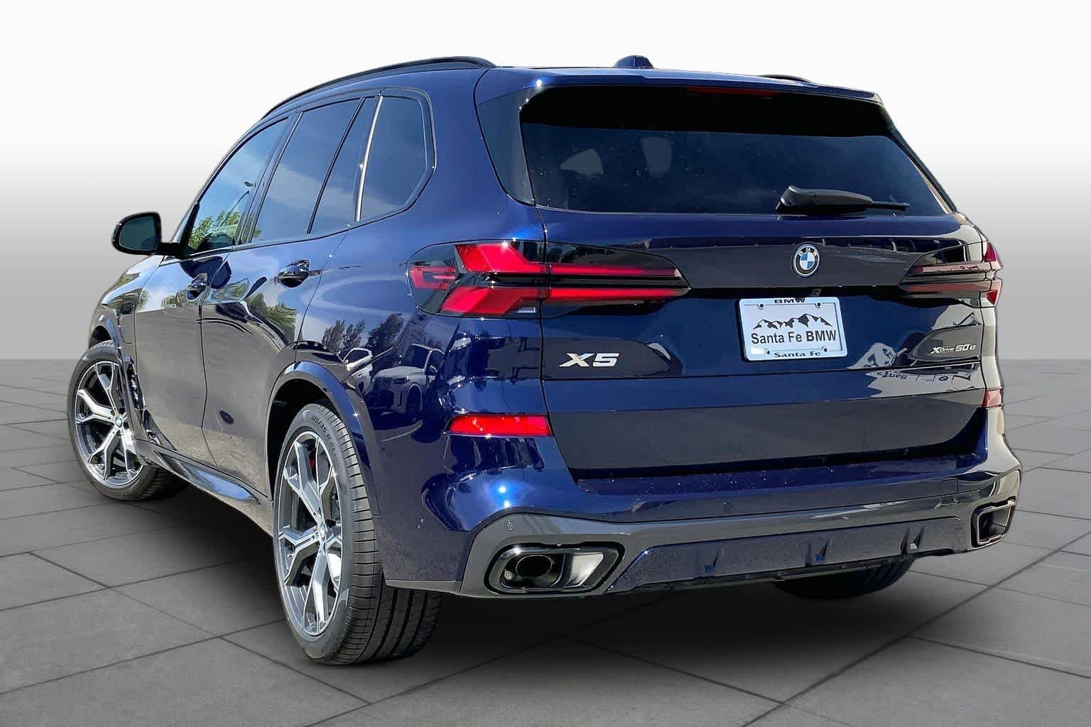 New 2026 Tanzanite Blue II Metallic BMW xDrive50e image 12