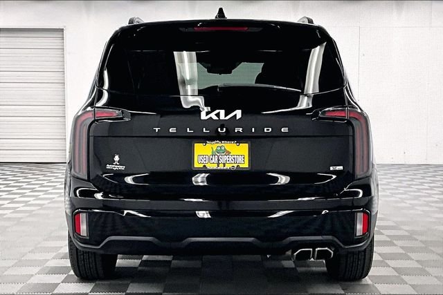 Used 2024 Ebony Black Kia SX-Prestige X-Pro image 5