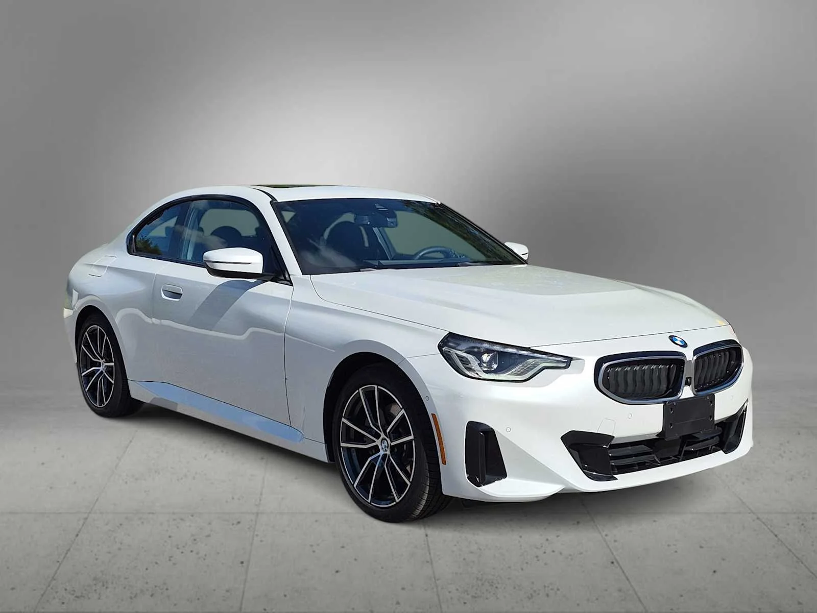 Certified Used 2025 Mineral White Metallic BMW 230i xDrive image 2