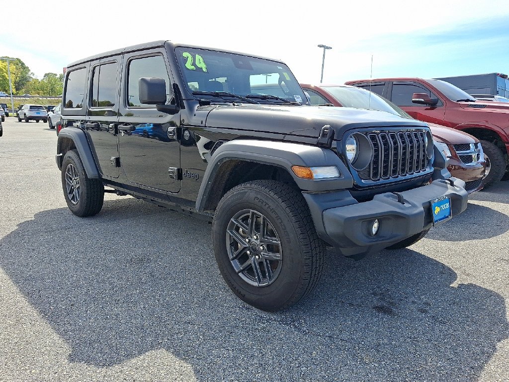Used 2024 Black Jeep Sport S image 1