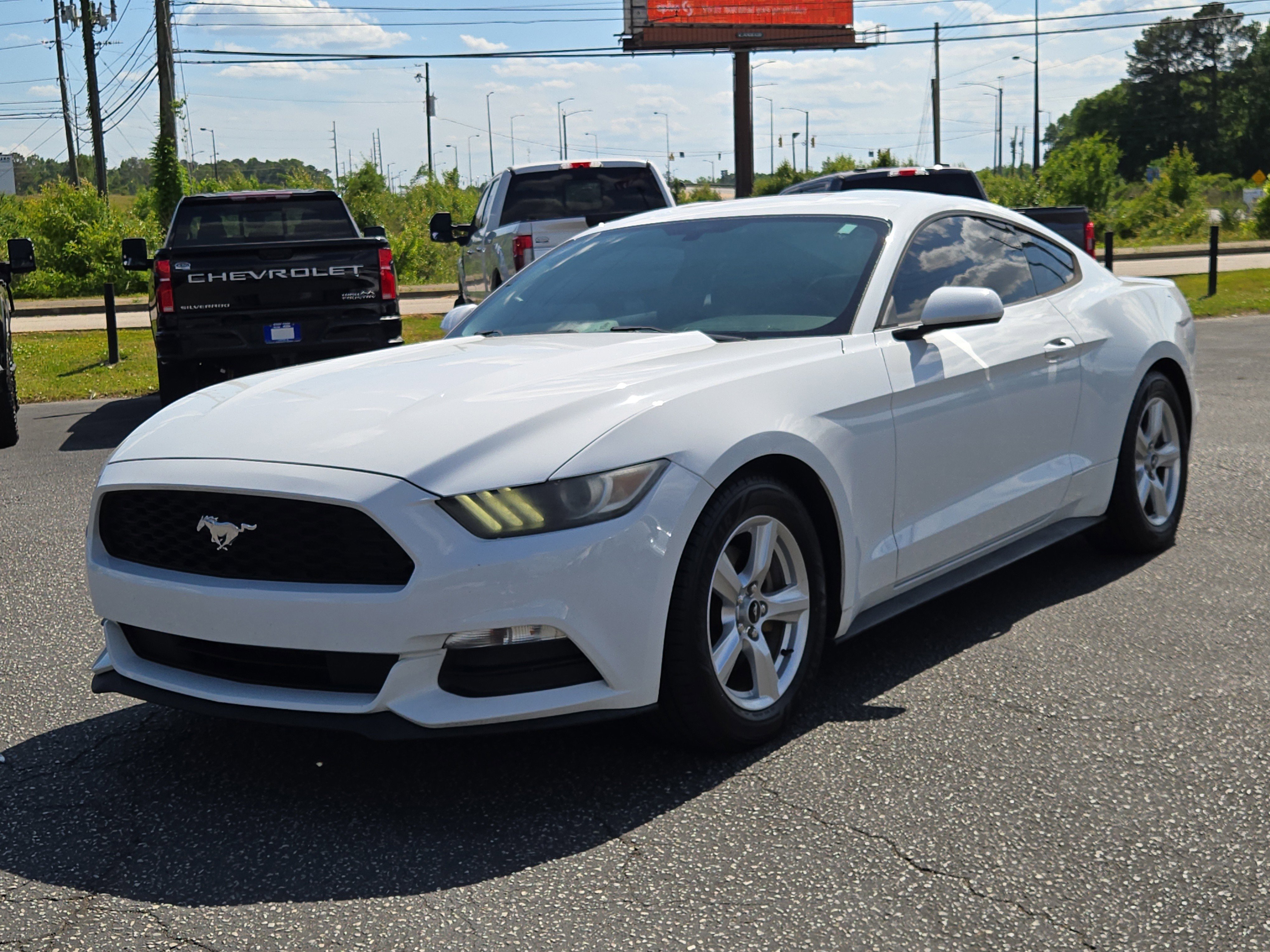 Used 2016 Ford Mustang V6 with VIN 1FA6P8AM0G5277076 for sale in Auburn, AL