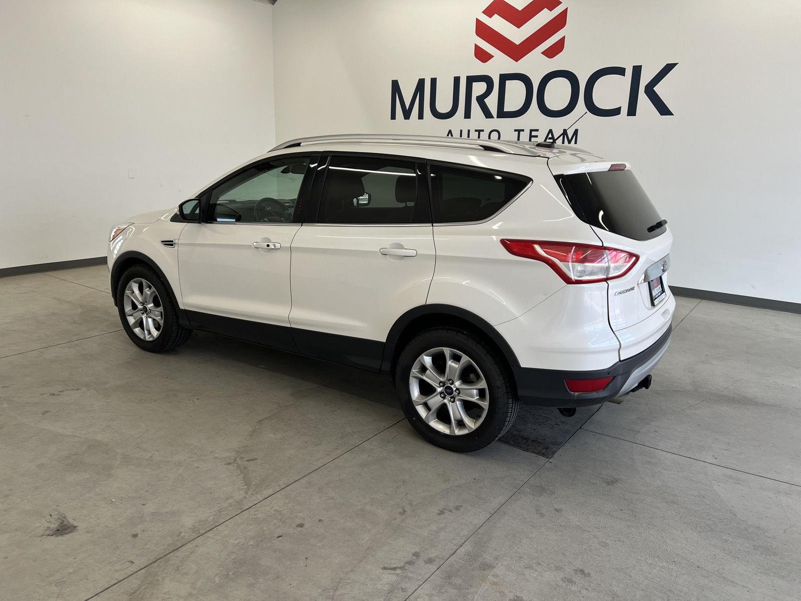 Used 2016 Ford Escape Titanium with VIN 1FMCU9J99GUC46644 for sale in Logan, UT