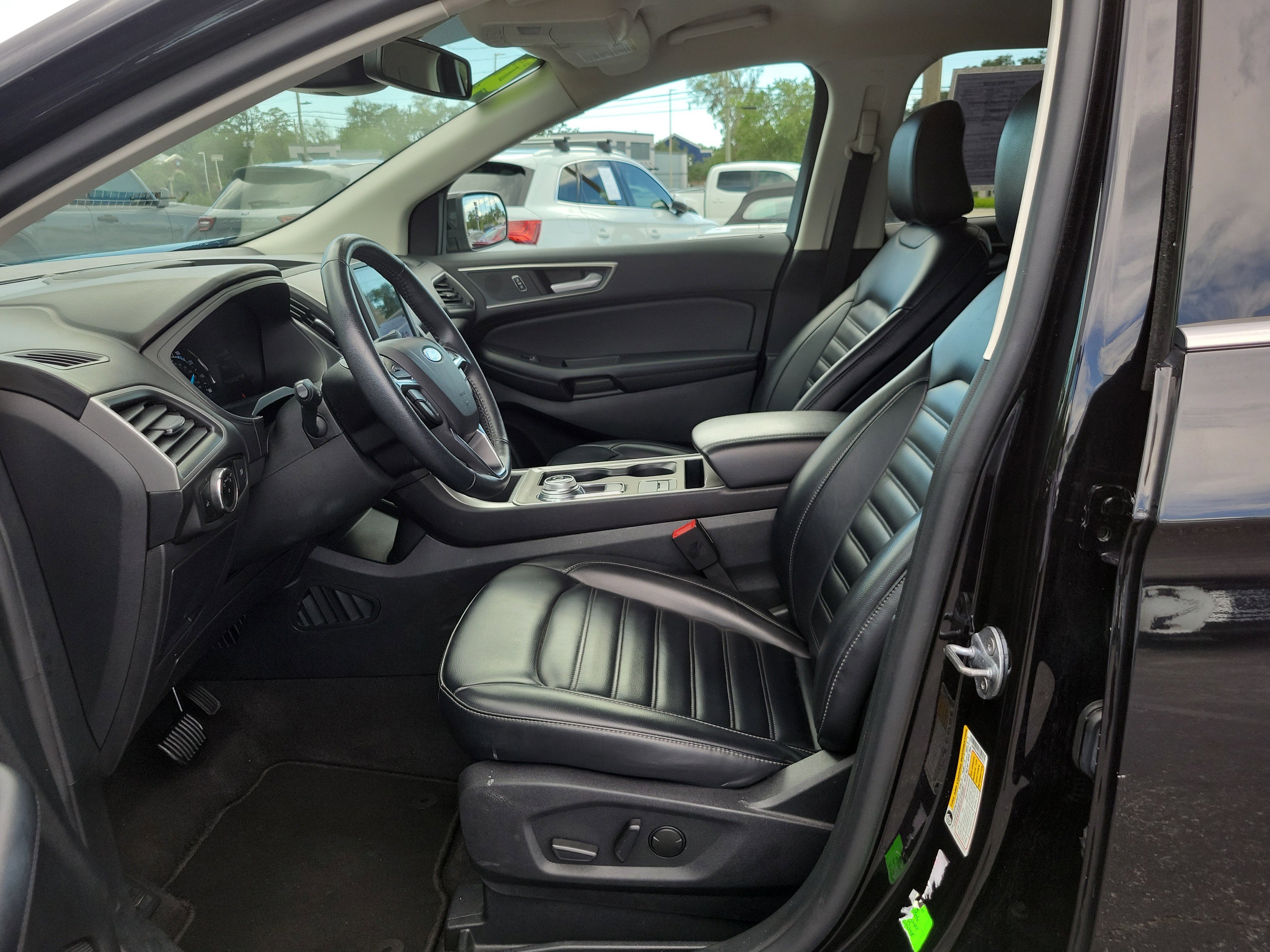 Used 2024 Agate Black Metallic Ford SEL image 20