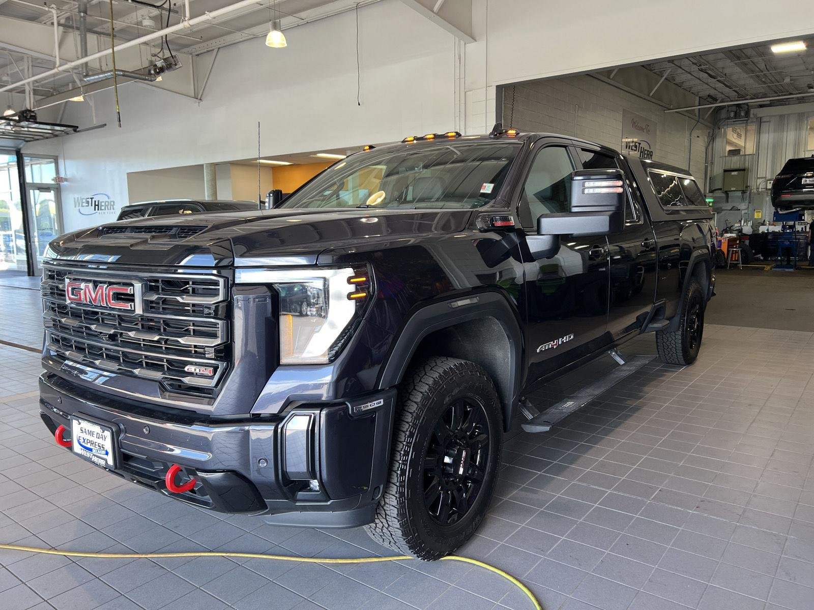 Used 2024 Titanium Rush Metallic GMC AT4 image 4
