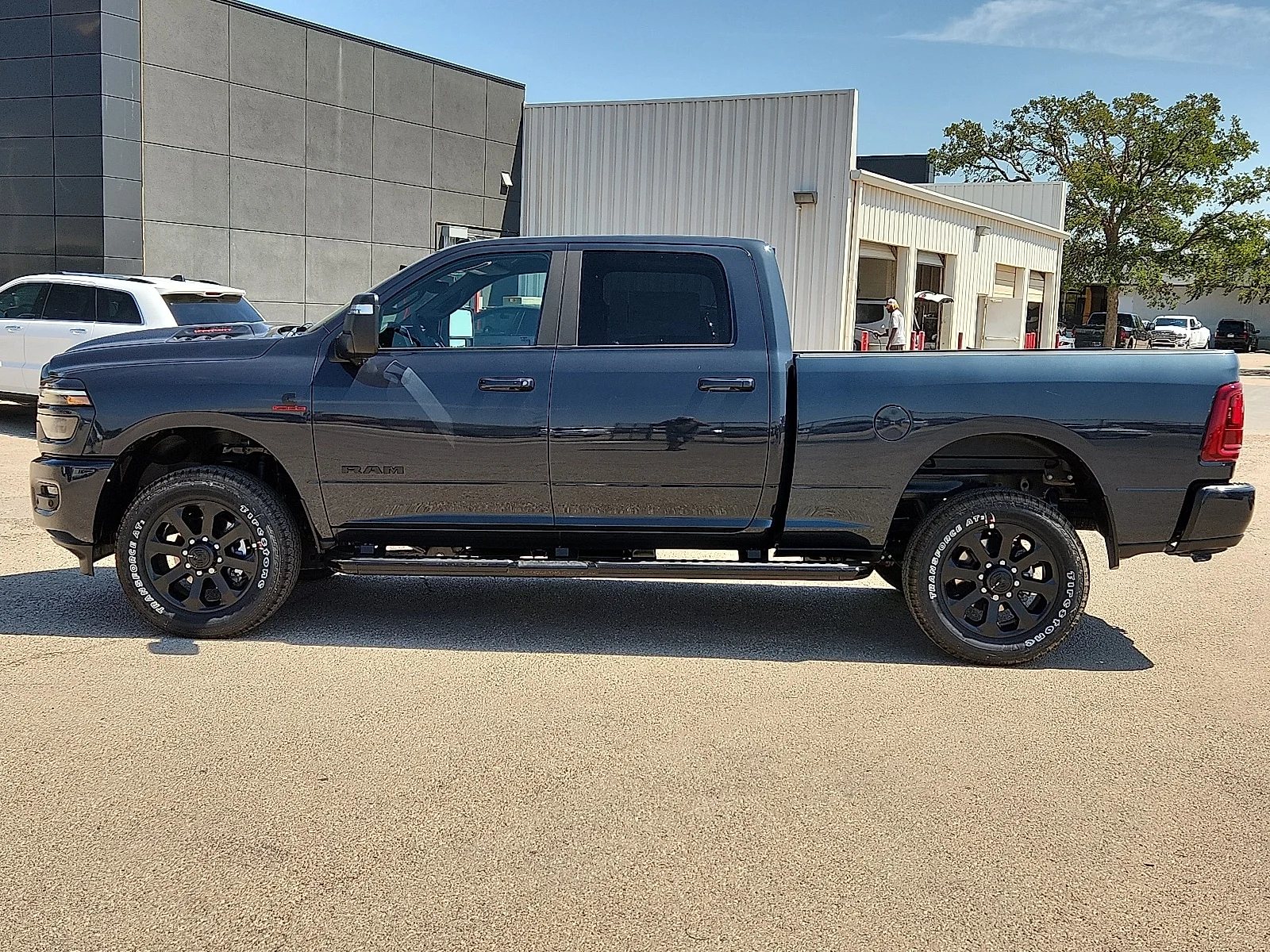 New 2026 Forged Blue Metallic  Paint Ram LARAMIE CREW CAB 4X4 6