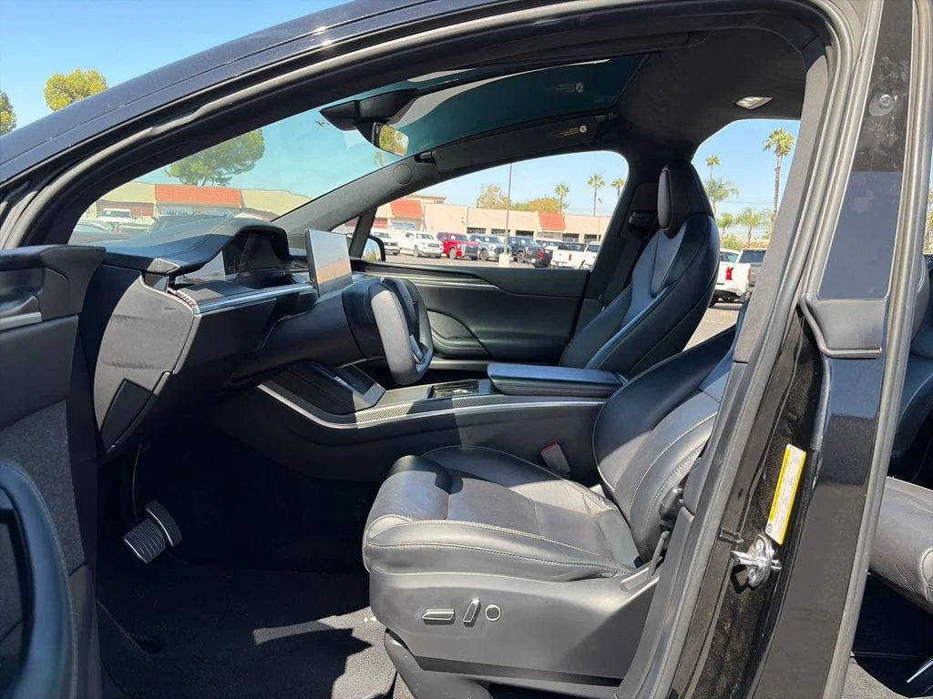 Used 2023 Solid Black Tesla Plaid image 9