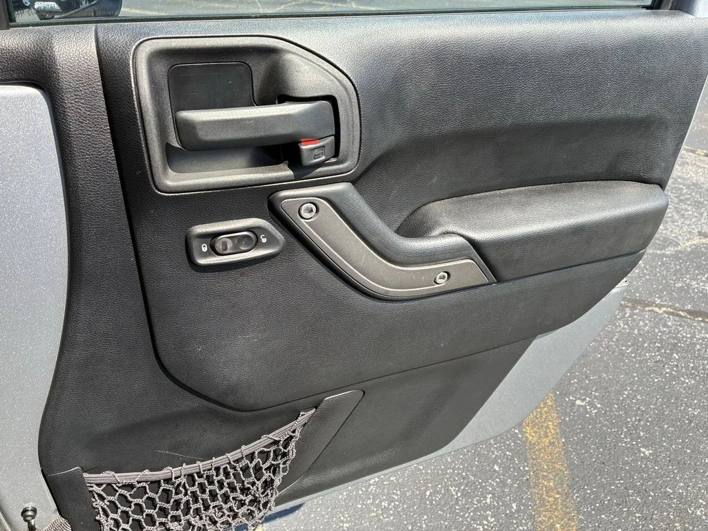 Used 2015 Silver Jeep Unlimited Sport image 23