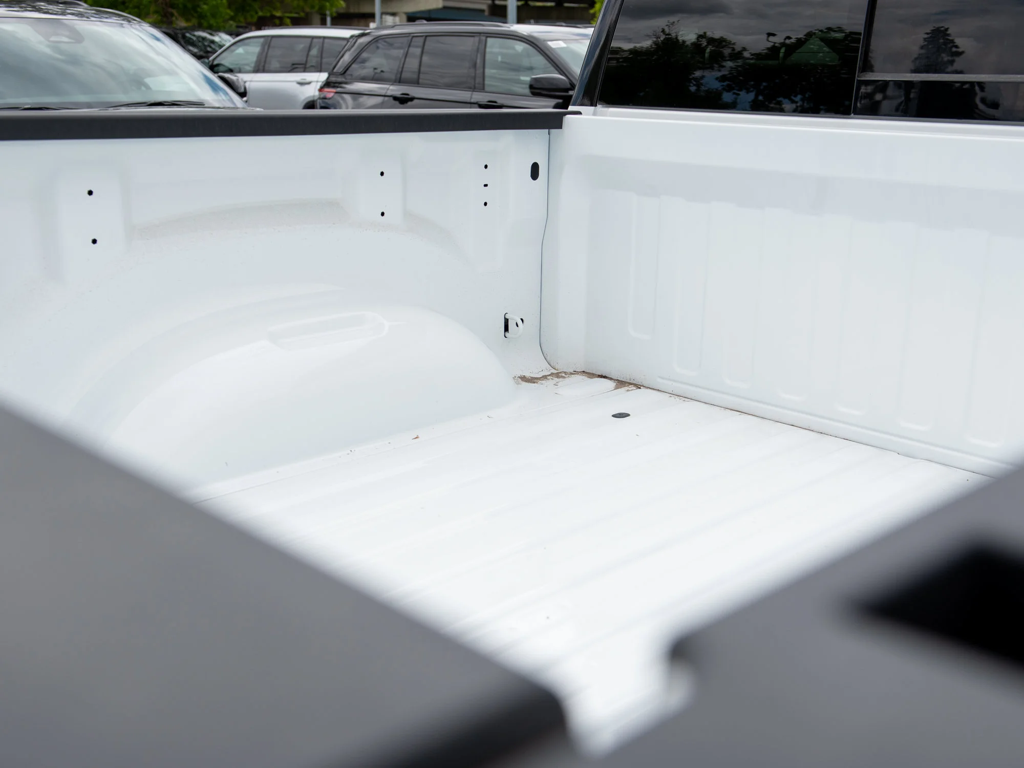 New 2026 White RAM Sport*, 2 Inch Lift, 33 Inch Tires image 6