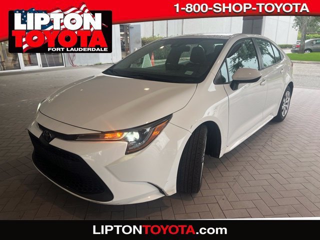 Used 2020 Super White Toyota LE image 1