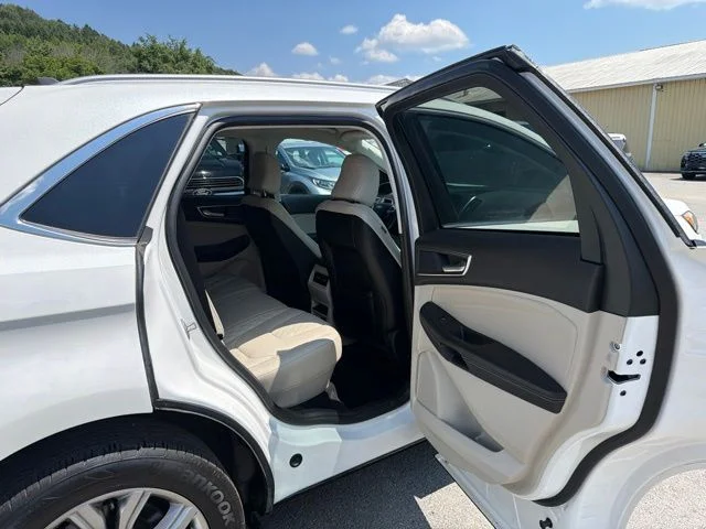 Used 2023 White Metallic Ford Titanium image 79