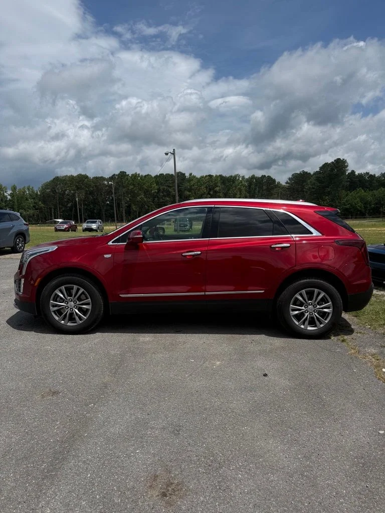 Used 2023 Red Cadillac Premium Luxury image 1