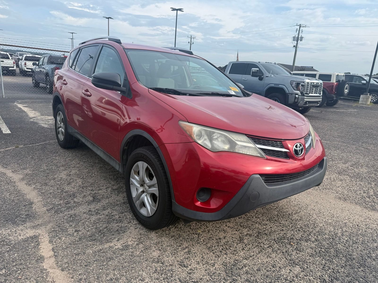 Used 2015 Red Toyota LE image 1