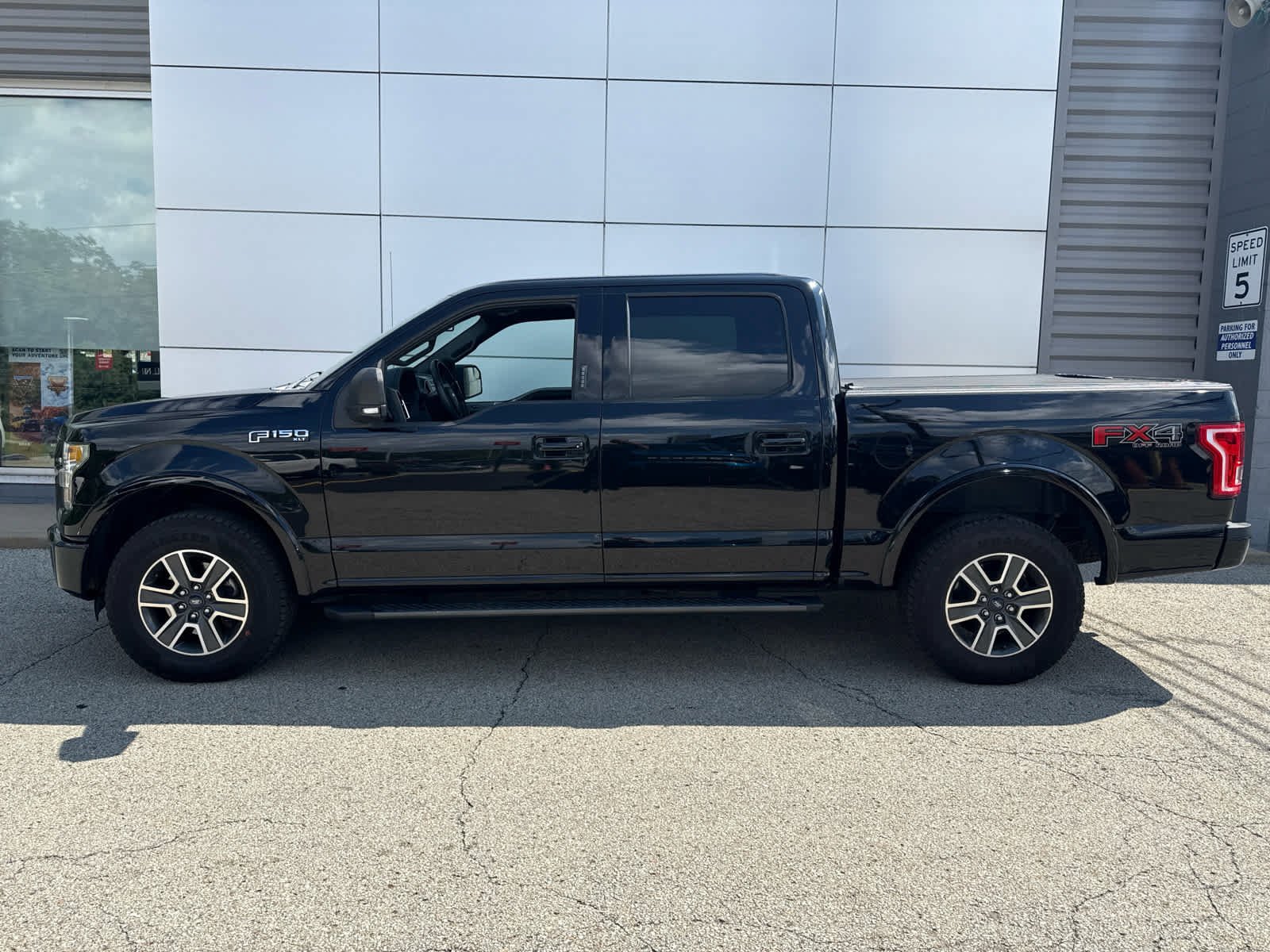 Used 2016 Shadow Black Ford XLT 4WD SuperCrew 145 image 6